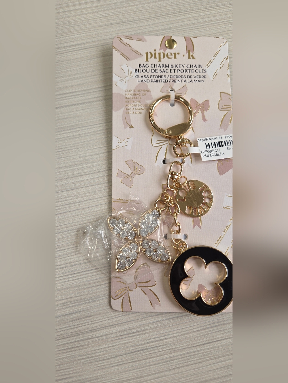 Piper Gold-Tone Floral Crystal Bag Charm with Black Enamel Medallion